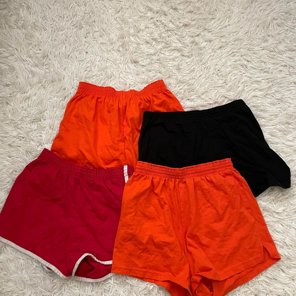 Four pairs of medium workout shorts